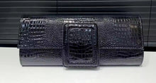 Black buckle clutch