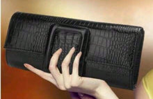 Black buckle clutch