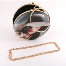 Round designer style clutch